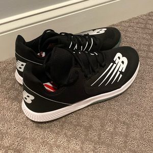 New balance baseball turf training shoes. Size 14. Black and white. Blue sole.